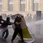 Paris Police Fire Tear Gas to Disperse Fresh Protests