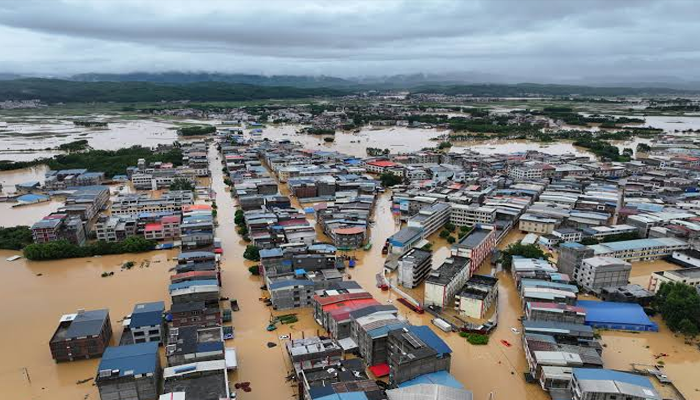 China Faces Double Disaster: Deadly Floods and Approaching Super Typhoon