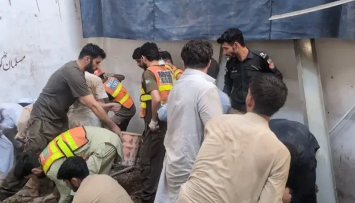 At least 28 killed, including 27 children and a teacher as Peshawar school roof collapse